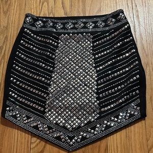 INCREDIBLE Main Strip embellished pyramid studded black skirt